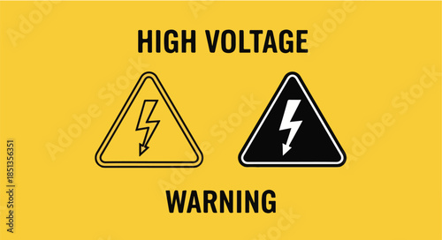 Close-up of high voltage warning signs on a yellow background with caution symbols.