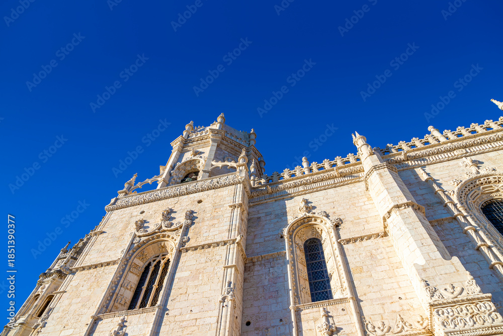 Fototapeta premium Church of Santa Maria de Belem at historic Jerónimos Monastery in Lisbon that was built between 1516 and 1518