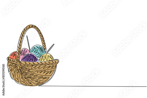 Single line drawing of a basket filled with colorful yarn balls symbolizes creativity and the nature concept, crafted for Worldwide Knit in Public Day, celebrating handmade art globally.