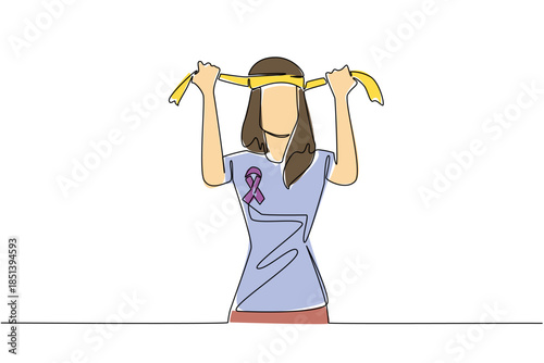 Continuous line drawing of a woman wearing a purple cancer ribbon on her shirt, tying a yellow headband in strength, symbolizing courage and hope for National Cancer Thriver Day.