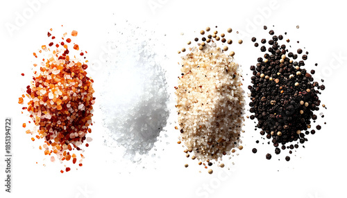 Four piles of different seasonings salt and pepper varietals and other flavorful options