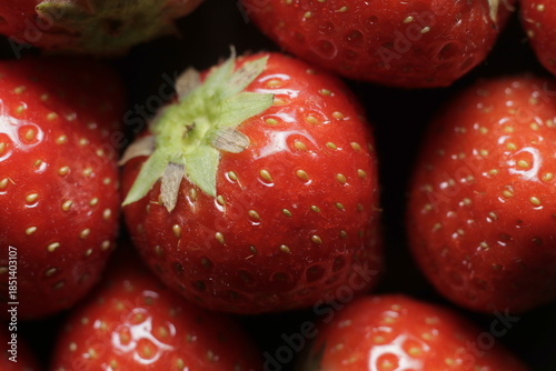 Strawberry close up studio shot over