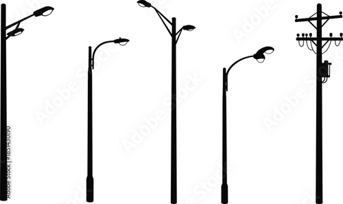 Silhouette of modern street light poles and electric utility pole, urban road lighting infrastructure, power line connection, and outdoor illumination system