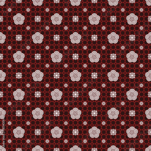 The background features a repeating red diamond pattern arranged across the entire surface. Overlaid on top are three different styles of graphic floral motifs, scattered evenly throughout the design.