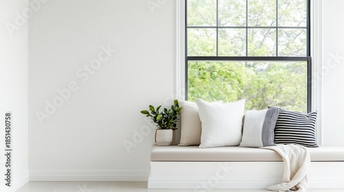 Cozy modern farmhouse reading nook with window seat and neutral textiles