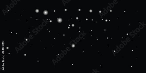 Falling snowflakes create an ethereal winter backdrop against dark night sky background.