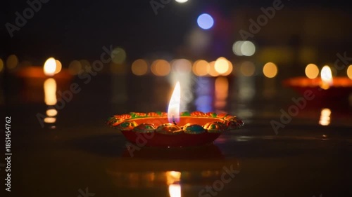 Diwali celebration with oil lamps and bokeh lights representing the festive spirit of this Hindu festival of lights