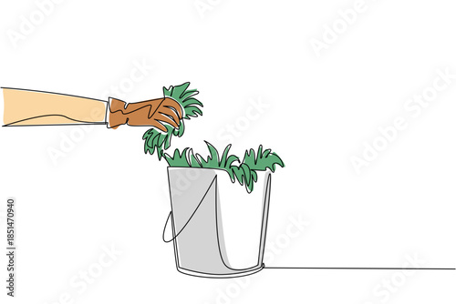 Single line drawing of gloved hand actively putting pulled weeds into bucket. Showing the manual labor and organized disposal involved in garden weeding. National Weed Your Garden Day event