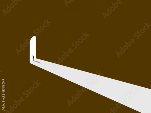 Businessman looks out the entrance door