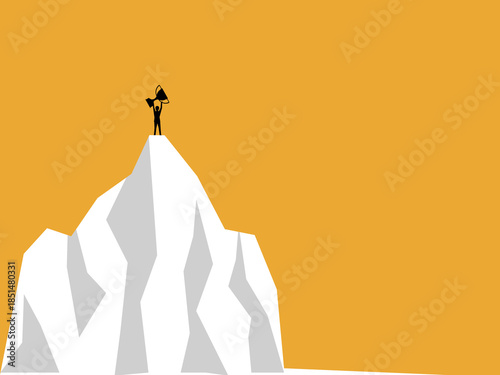 businessman holds a trophy on a high mountain