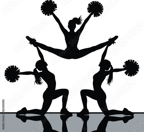 Cheerleaders in Silhouette Performing Stunts with Pom Poms