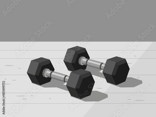 Three dumbbells arranged on a white floor against a gray wall