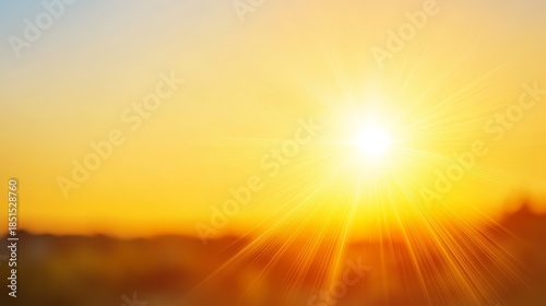 Vibrant golden sun radiance bathes expansive azure sky with brilliant light and warmth displaying natural splendor.