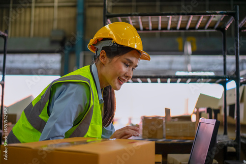 Fényképezés Blue collar worker is working at warehouse.
