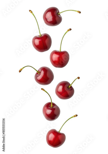 Fresh cherries falling in mid air isolated on transparent background