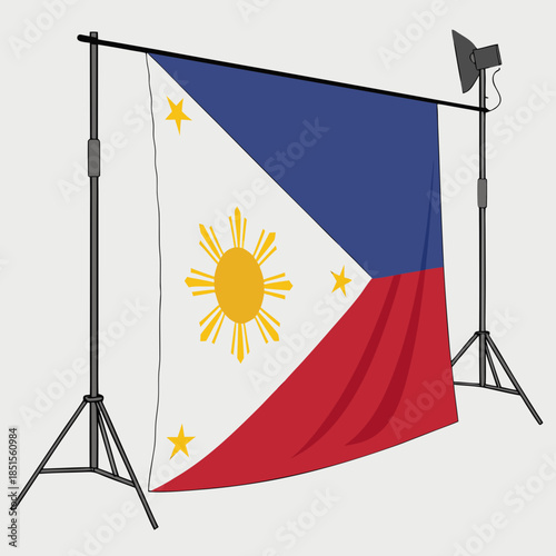 Philippine flag displayed on a studio backdrop stand with a spotlight ready for a photoshoot or presentation.