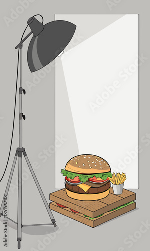 Professional food photography setup with burger and fries.