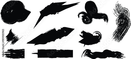 Collection of black brush strokes and smudges on white background