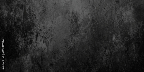 A grayscale abstract background featuring a textured mottled surface with varying shades of gray and subtle tonal shifts