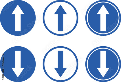 Collection of blue circular directional signs with white arrows pointing both upwards and downwards