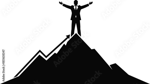 Man standing on mountain peak with arms raised in triumph