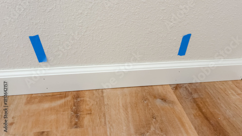 Baseboard marked for paint touch-up