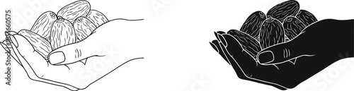 A hand holding dates