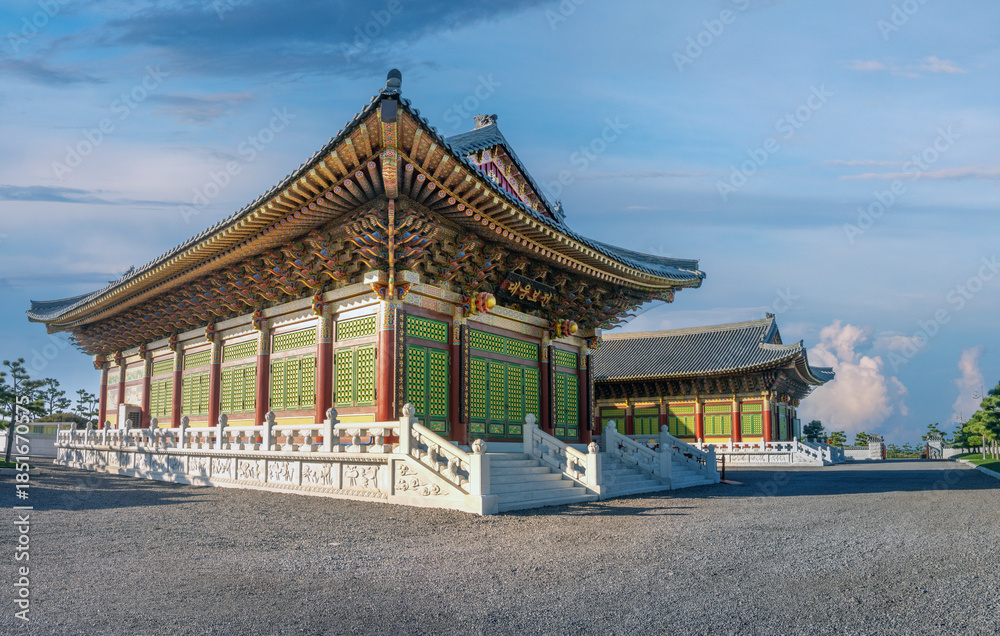 Fototapeta premium Buddhist temple halls on the coast between jeju city and Hamdeok beach, Jeju Island, South Korea