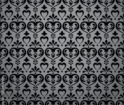 Wallpaper in the style of Baroque. Gray and black floral ornament. Seamless vector background. Graphic pattern for fabric, wallpaper, packaging. Ornate Damask flower illustration