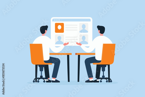 Two people are conducting an online interview using a laptop