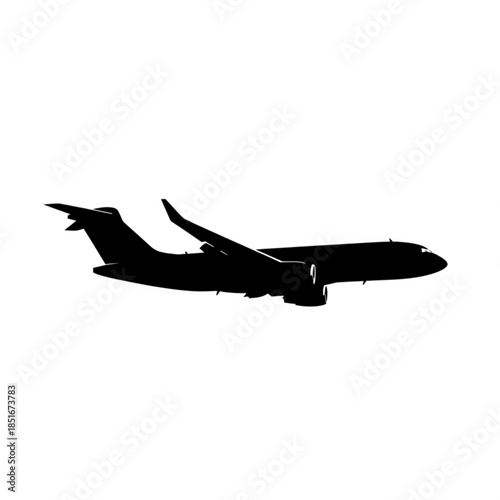 Silhouette of a large commercial airplane flying in the sky