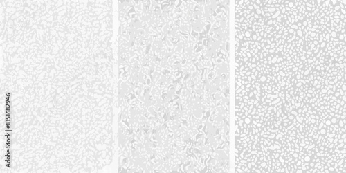 A close up view of three textured white surfaces with irregular patterns