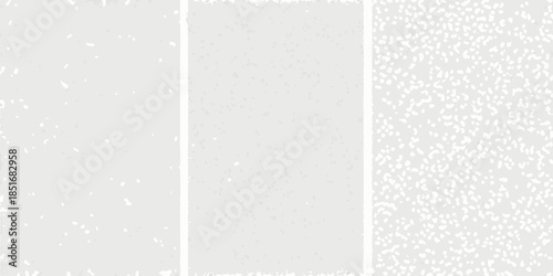 Abstract gray textured background with varying speckle density