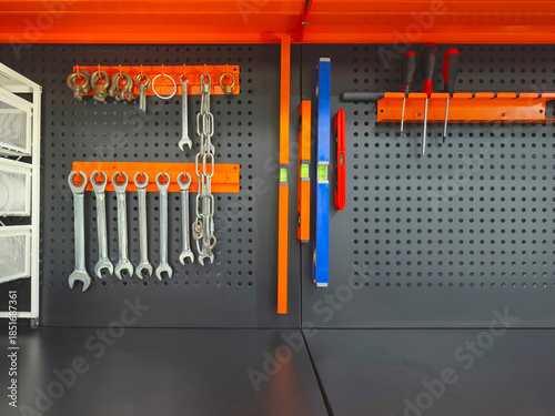tool kit hanging on the stand wall
