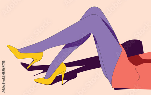 Woman lying on floor with legs raised wearing high heels in a relaxed pose