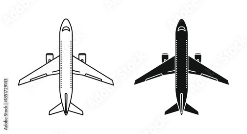 Aerial view of two passenger airplanes one white and one dark a striking silhouette