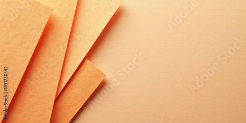 Abstract Composition of Peach-Colored Paper Sheets Arranged in an Overlapping Pattern on a Light Background