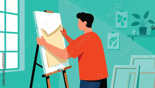 Artist adjusts painting on easel in bright studio