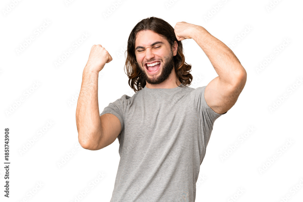 Fototapeta premium Young handsome man over isolated chroma key background celebrating a victory