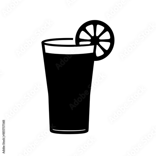 Glass of dark beverage with lemon slice