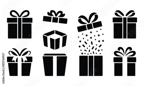 Set of black gift boxes with ribbons and bows keywords gift present box ribbon bow celebration