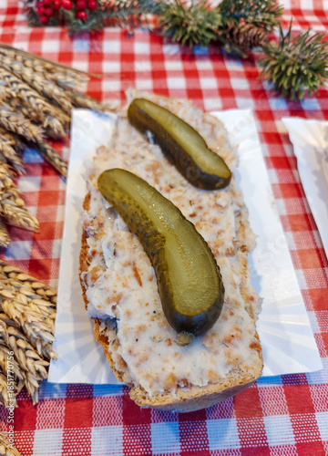 Wallpaper Mural "Pajda ze smalcem" is a traditional Polish sandwich with thick slice of hearty bread, spread with a savory spread made of rendered pork fat. Served with pickled cucumbers Torontodigital.ca