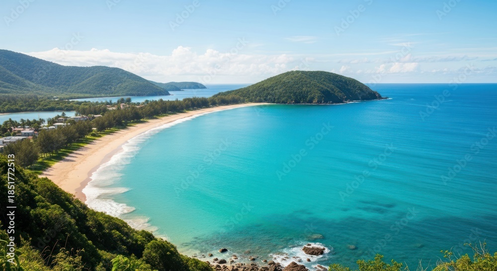 Fototapeta premium Idyllic tropical beach and turquoise sea, surrounded by green hills