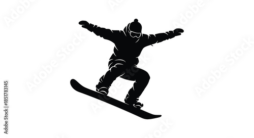A dynamic snowboarder in mid air arms outstretched captured in a striking silhouette