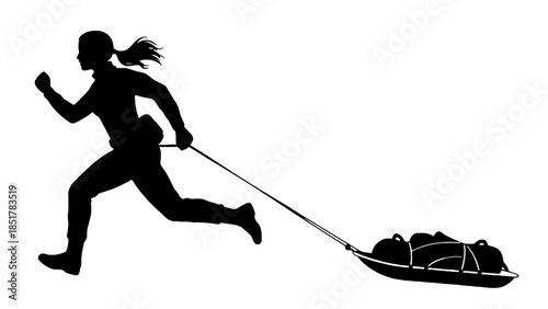 Silhouette of a woman running and pulling a sled with gear