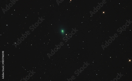 Comet or interstellar object known as 3I/Atlas through the stars in the Lion constellation, taken with amateur telescope.