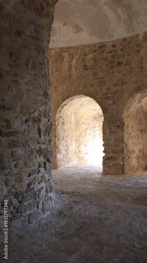 Fototapeta premium An ancient stone arch on the seashore. High quality photo