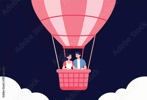 Couple in hot air balloon over clouds at night