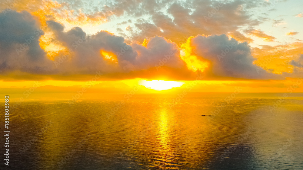 Obraz premium Golden hour sunset with tranquil calm rippling sea waves dreamy scenery sunlight. Beach shore at sunrise, beautiful color sea sunset.