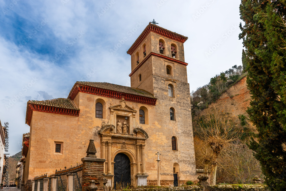 Naklejka premium Church at the foot of the cliff where the Alhambra is located in Granada, Andalusia, Spain